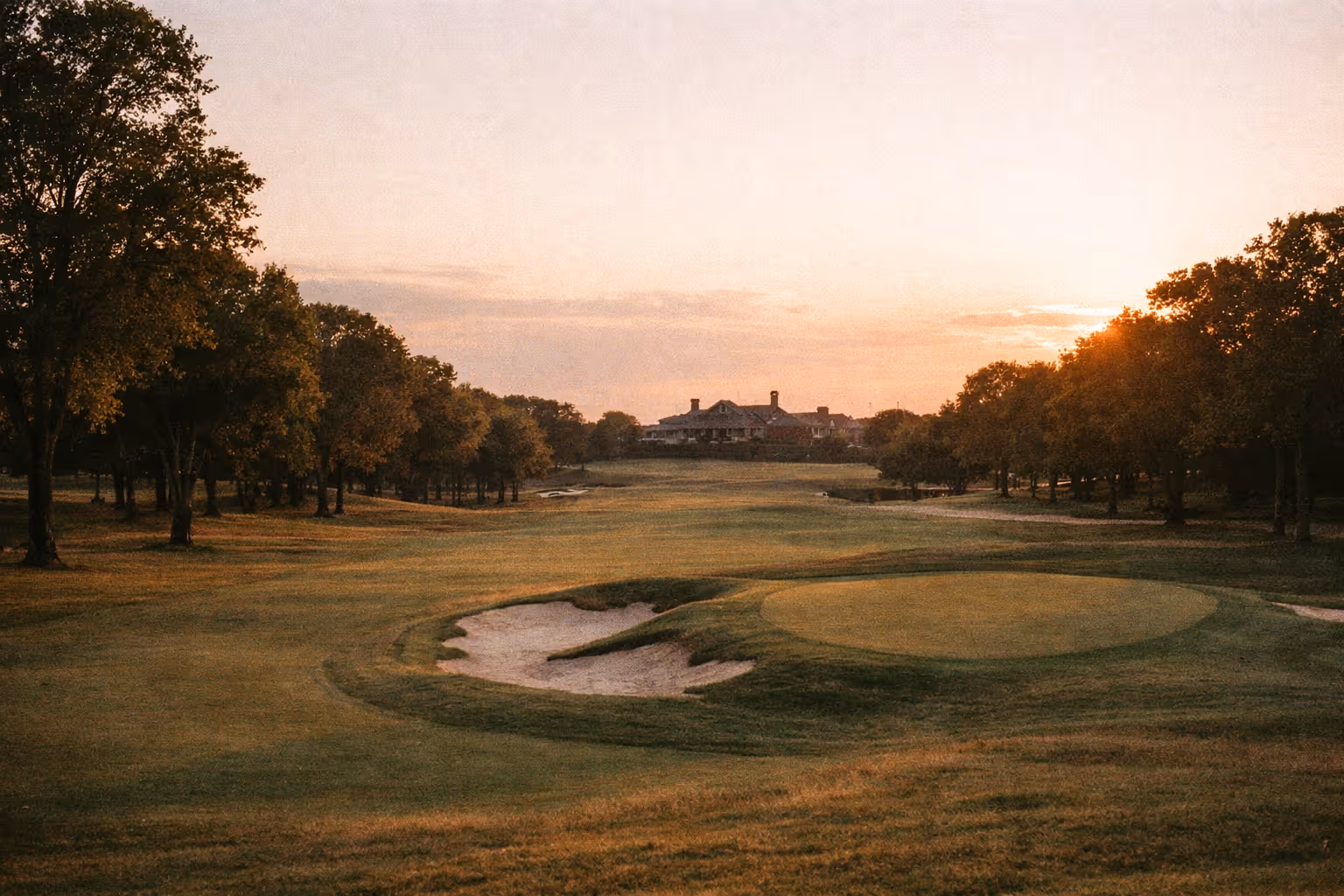 Brook Hollow Golf Club course at golden hour with historic Tillinghast design near Dallas